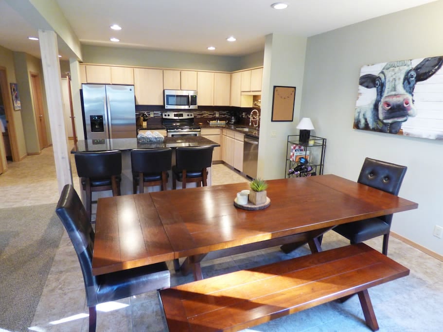 The dining room table extends to accommodate eight guests easily.