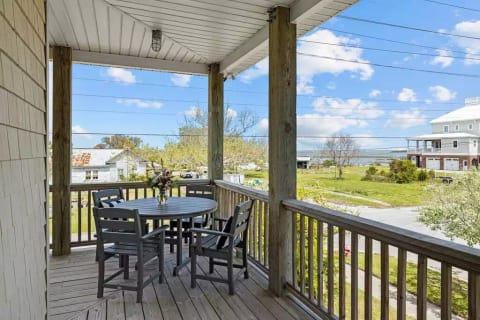 WRAP AROUND DECK WITH OUTDOOR POLYWOOD FURNITURE