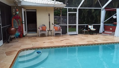 Screened Pool Area, with Full Sun Exposure for Tanning, & Fenced Back Yard