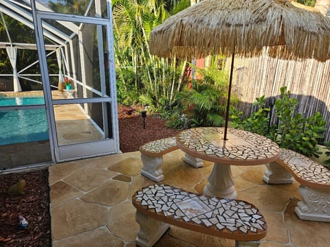 Another Outdoor Seating Area with Lovely Pool View