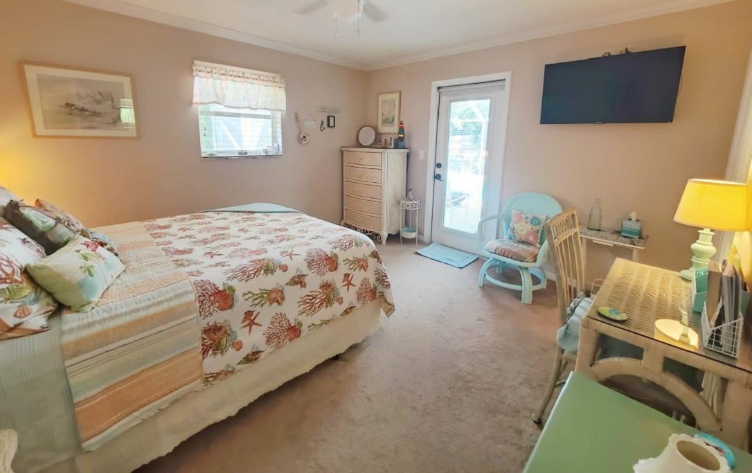 "Hawaii" Bedroom {Glass Door has Built-In Blinds & Pull-Down Shade}