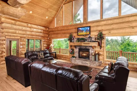 Lots of space in main living room for everyone to gather around the fireplace