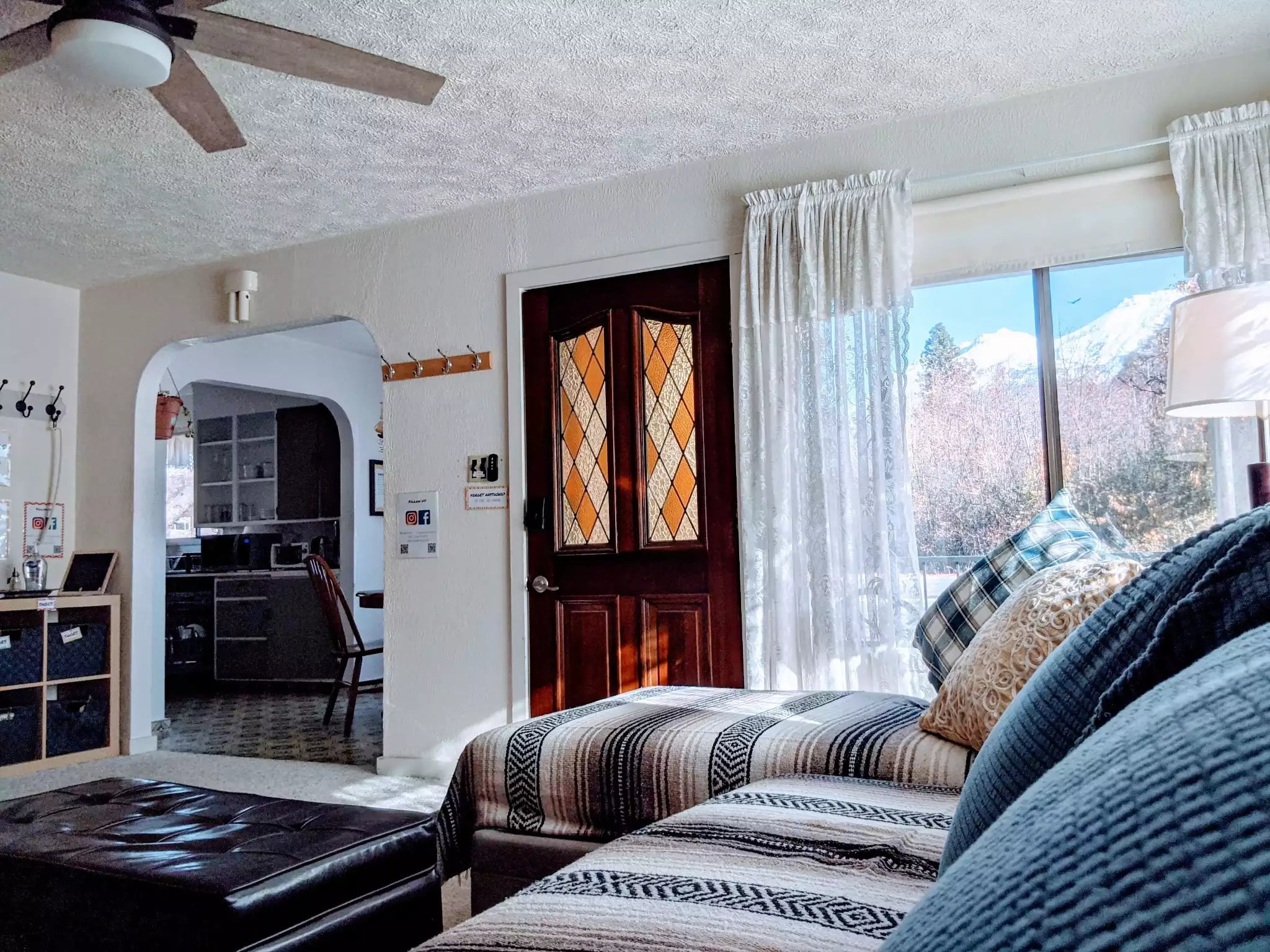 Situated right under the heater/AC with a tranquil view of the mountain, this is a bright, cozy spot to curl up any time of day, any season!