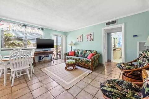 Living room with queen sofa bed and upgraded mattress. Comfortable rocking chairs. Smart TV - guests can use their Netflix, Amazon movie's, Hulu, etc. Basic cable is available in the living room TV as well.