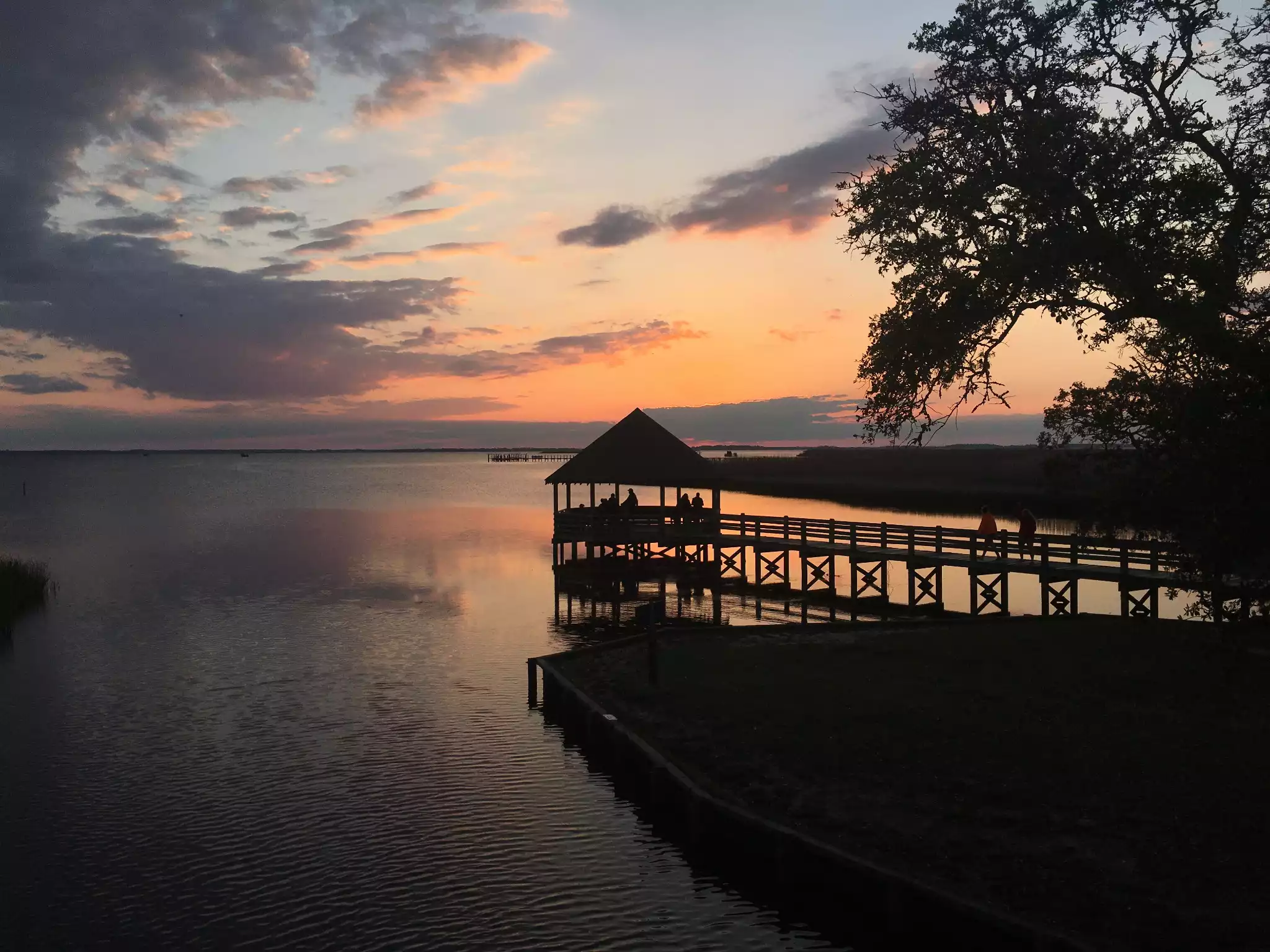 Sunset view over the sound from the historic bridge at Historic Corolla Park. Sunset view over the sound from the historic bridge at Historic Corolla Park. - Corolla Sunset in the Villages at Ocean Hill - Corolla