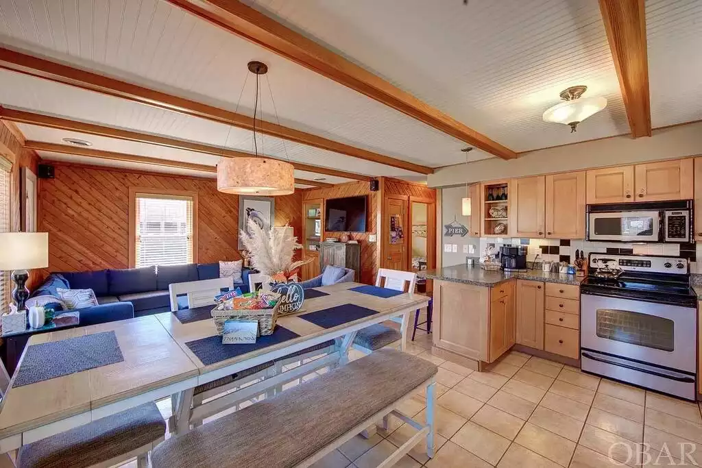 Our open concept living area has plenty of room for your whole family, friends, and drops ins! A welcome basket greets every guest at Sea Winds OBX - what sort of treats will be awaiting you? - SeawindsOBX Oceanfront in Rodanthe - Dog Friendly! - Rodanthe