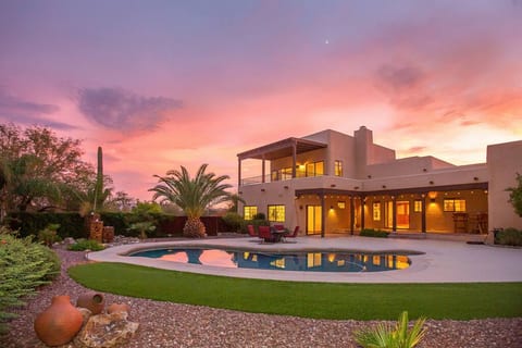This massive backyard and pool are all yours to enjoy! Don't worry you'll see in other pictures that there's lots of seating for everyone to hangout poolside.