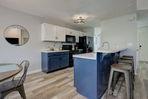 Create warm culinary delights in the fully-stocked kitchen for you and your entire family all while enjoying what is happening in the living room with the open floor plan