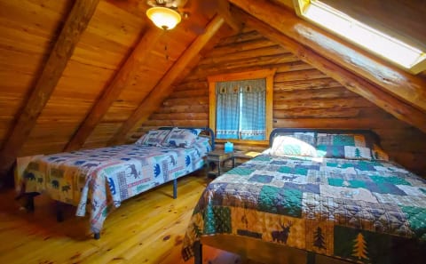 Two queen beds and 2 dressers