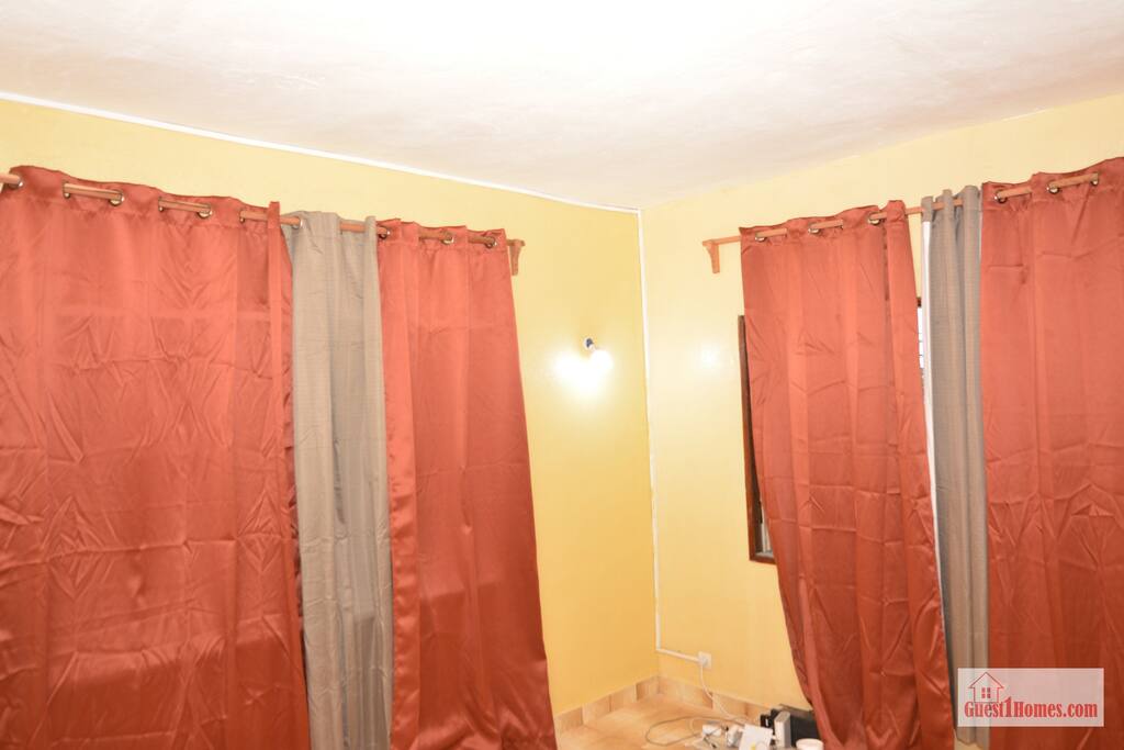 Second floor apartment cozy living room. - The 6 Roses Full 2nd Floor, Safe, King Beds, Wi-Fi - Porto-Novo