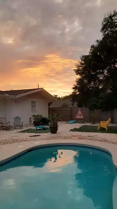 Sunset over the back yard Sunset over the back yard - PCBCoolest House-Private POOL-Tiki theme-Golf Cart - Carillon Beach