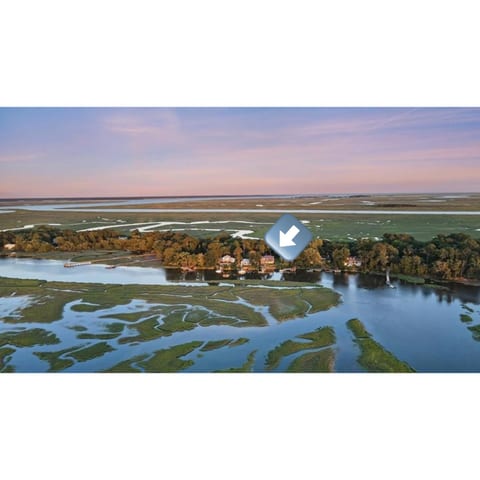 The house is furthest on the right, located on a bend of Hudson Creek.