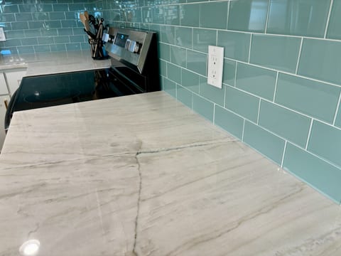 Updated quartzite and backsplash