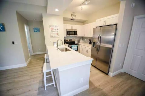 New Kitchen featuring Quartz Countertop and Stainless Appliances
