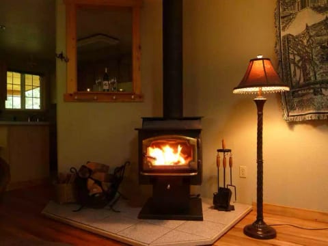 Hear the crackle and feel the glow of the wood fireplace while snuggled on the couch.