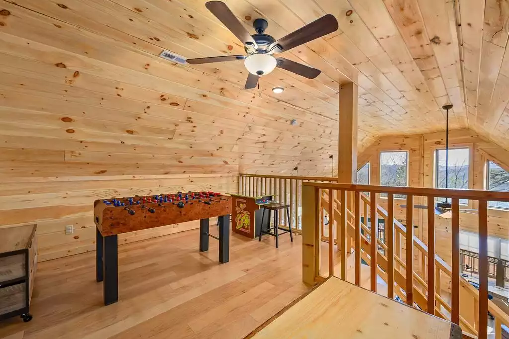 Loft with queen sofa bed, foosball table, arcade/gaming table, and board games Loft with queen sofa bed, foosball table, arcade/gaming table, and board games - Logging Out Cabin - Sevierville