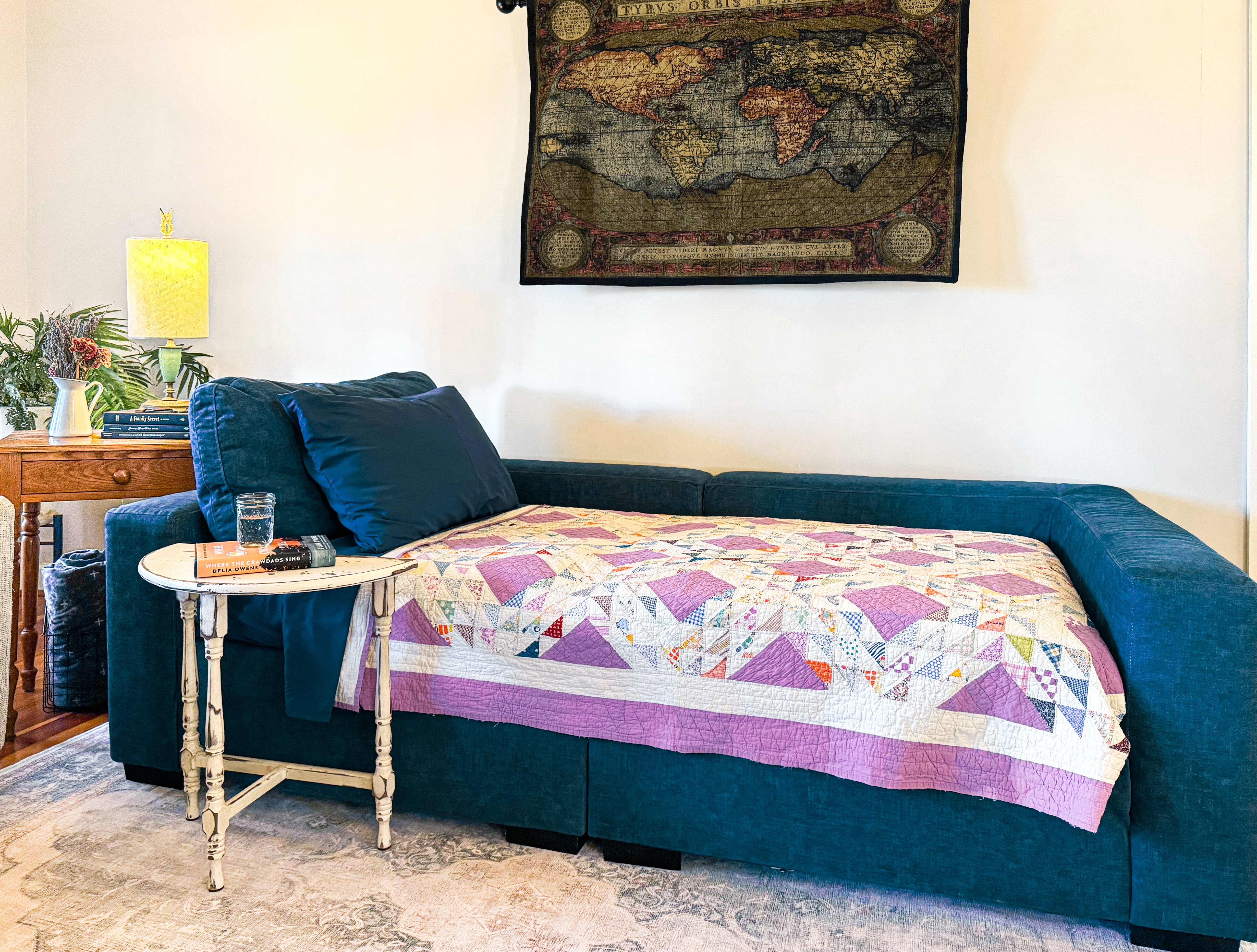 Couch made up as a twin bed.