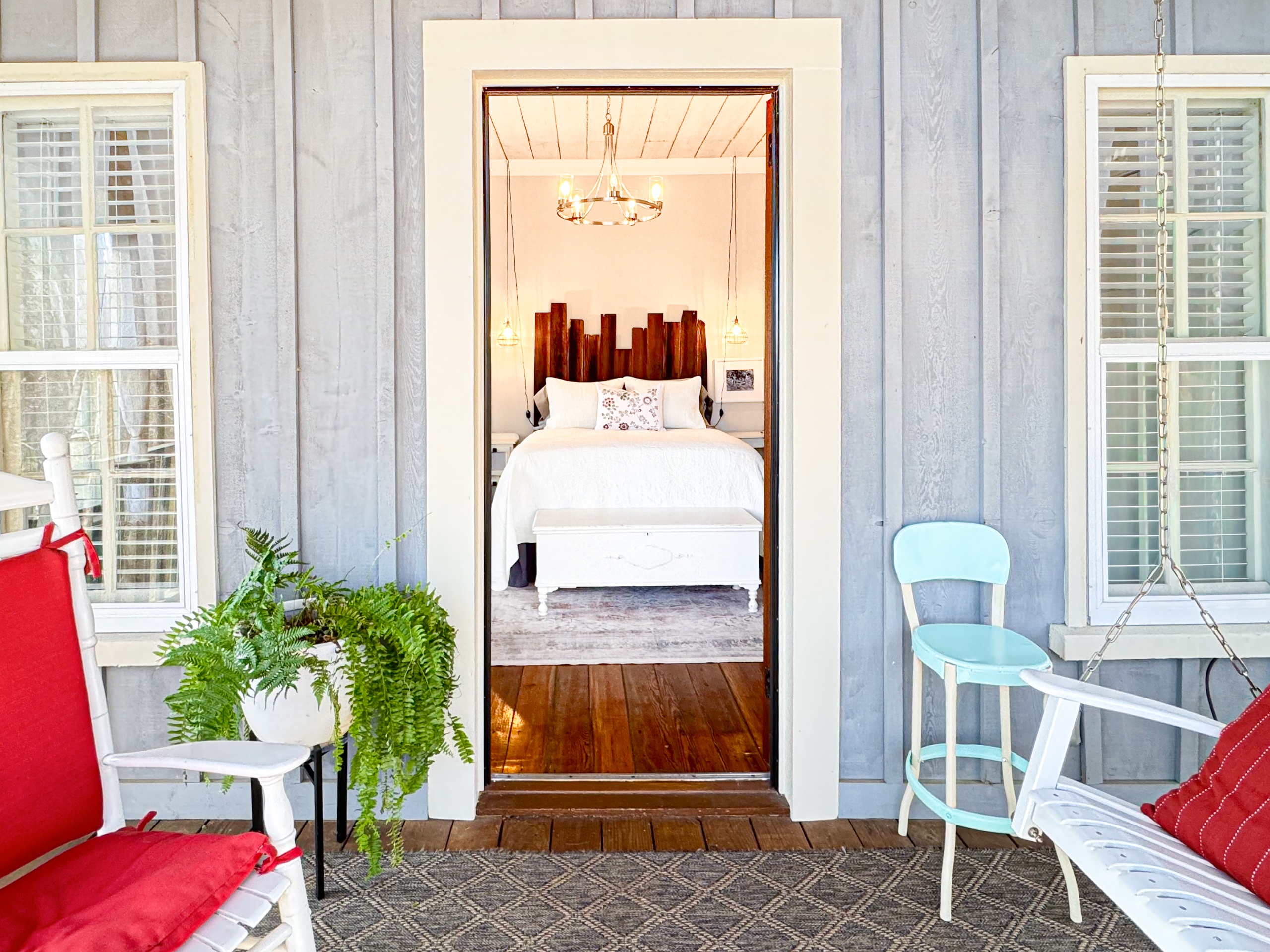 Relax on the private master bedroom screened porch. The Schoolhouse Cottage: Historical & Dog-friendly