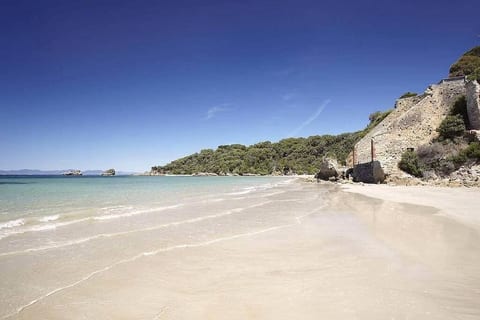Azure waters of Walkerville South(Magic beach)& historic lime kilns along the beach, remnants of a bustling township from the 1800's.Walkerville Bay looks over to Wilson's Promontory