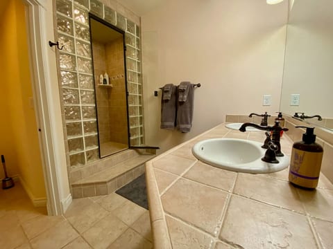 Private bathroom - Two sinks, a large shower, and plenty of room for two people to get ready.