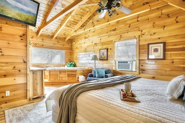 Escape to luxury in our private upstairs master suite. Enjoy a King bed, Jacuzzi, and high ceilings for unparalleled comfort.