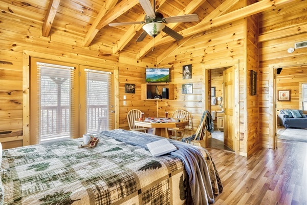 Experience the airy charm of our open loft with a comfy queen bed upstairs. Your elevated sanctuary awaits!