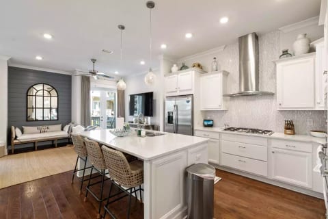 Three comfy bar stools with backs