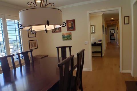 The dining room looks right out onto the pool deck.