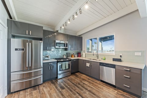 Sailboat Sunsets Beach House