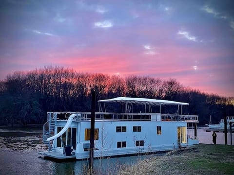 Floating stationary houseboat on river!