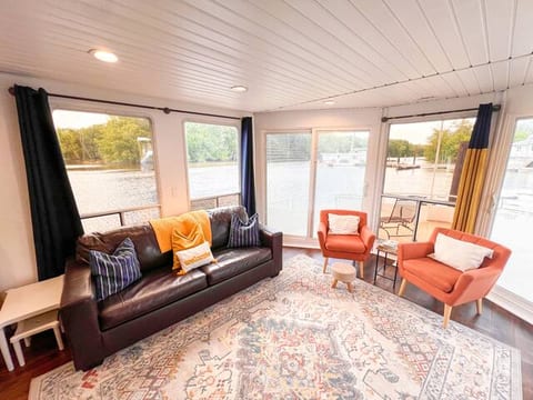 Floating stationary houseboat on river!