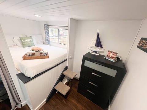 Floating stationary houseboat on river!