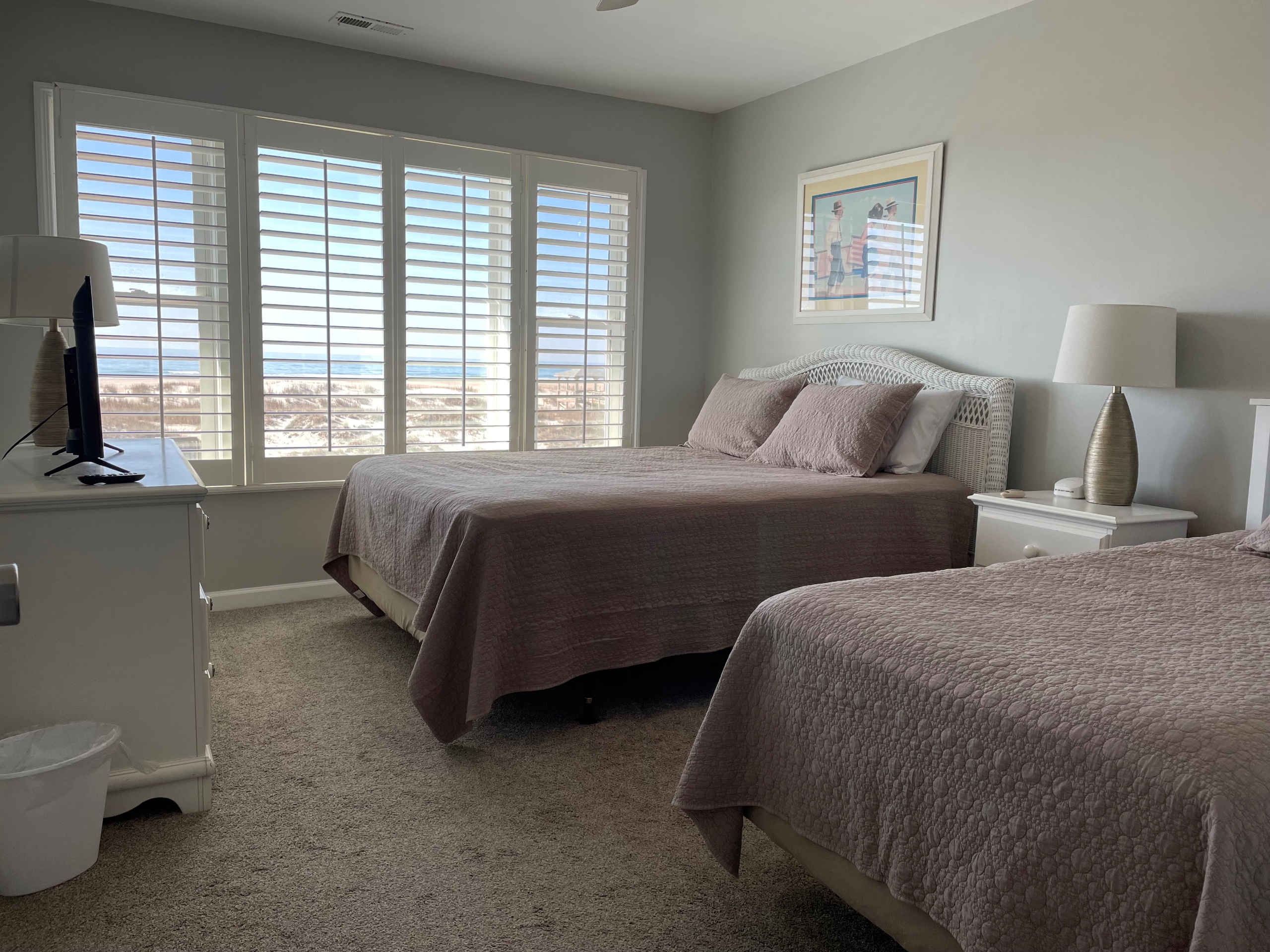 Oceanfront bedroom with queen and twin beds