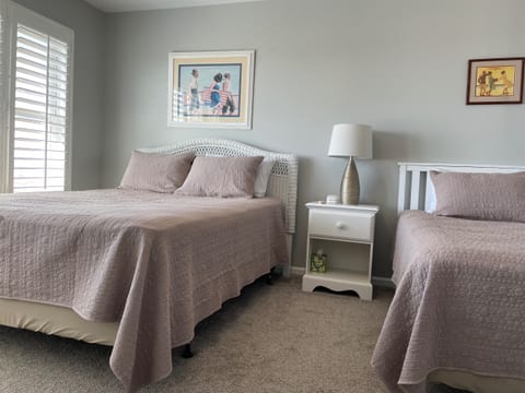 Oceanfront bedroom with queen and twin beds East
