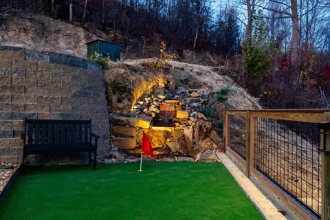 Putting Green with Serene Waterfall and Sitting Area looking out at the Incredible Views
