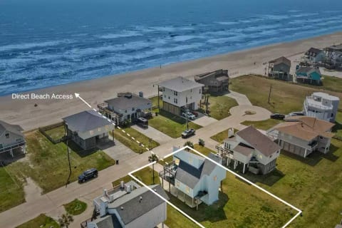 Welcome to the NEW Galveston beach home bungalow equipped with high-quality amenities & direct beach access in front of the property!