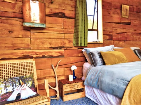 Recycled rimu wood panelling.