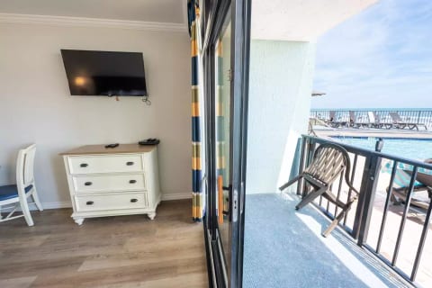 Bedroom/Living Area that Overlooks Ocean and Pools