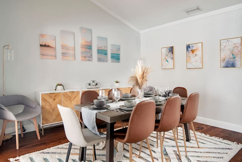 Elegant dinning room overlooking Lanai into the pool deck.