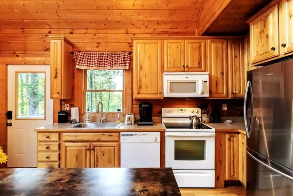 Fully stocked kitchen with Keurig & standard coffee maker. Coffee provided! Fully stocked kitchen with Keurig & standard coffee maker. Coffee provided! - The Blue Ridge Cabin - Roseland