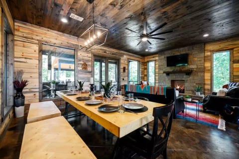 The heart of the Iron Wolf is this custom handmade table. Fit all your guests around the table for a fun game, special meal, or just get some work done. The open concept makes its great for spending time together!