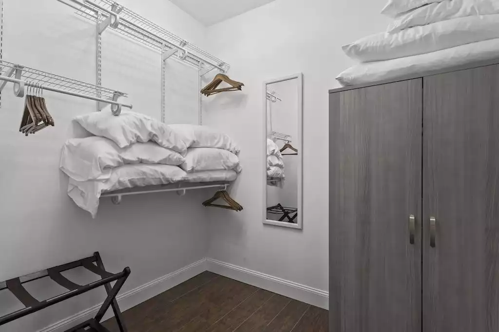 Extra large master bedroom closet with extra bedding available if needed Extra large master bedroom closet with extra bedding available if needed - NEW Gulfport Cottage Near Beach! - Gulfport