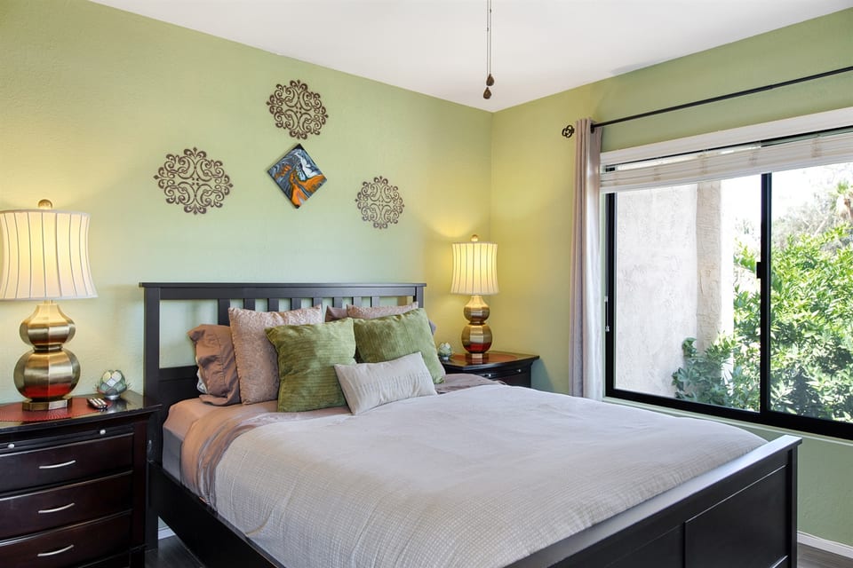 Experience the perfect blend of comfort and tranquility in our master bedroom. With the bed beside the window, you'll enjoy both relaxation and the soothing embrace of natural light. Your ultimate haven for rest and rejuvenation.