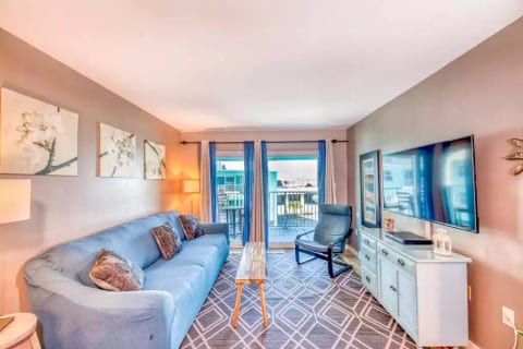 Spacious family room with 55-in Roku TV.