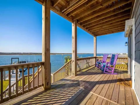 Main level balcony with great rocking chairs to enjoy the sunset