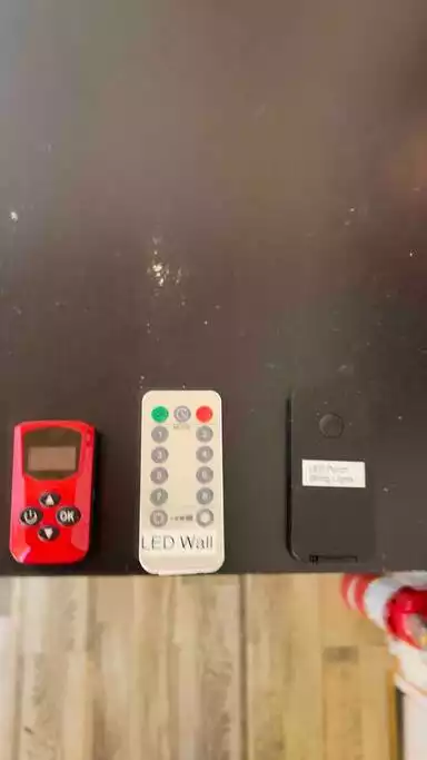 Red Remote = Heater Controls

White Remote = LED Waterfall Wall Lights (8 button is constant on)

Black Remote = Porch Solar LED String Lights - The Cozy Tiny Cabin @ ikigai Animal Sanctuary - Orange Cove