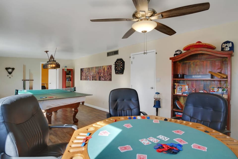 Poker table, ping pong, pool table, and bumper pool table, along with darts, checkers, and board games galore--what else could a group want?