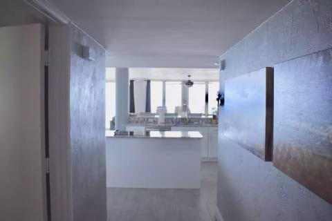 Hallway to oceanfront kitchen area