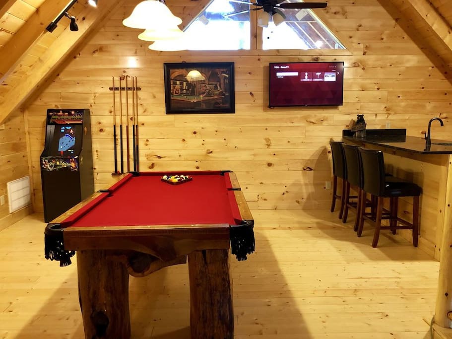 Custom built Logged Pool Table with Arcade, Wet Bar, and 50" Roku TV