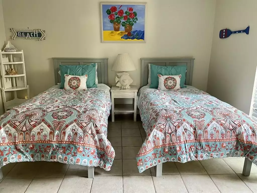 First floor bedroom with 2 twins and bunkbeds.  It's a great space for kids. - Seas The Day - Saint Simons Island